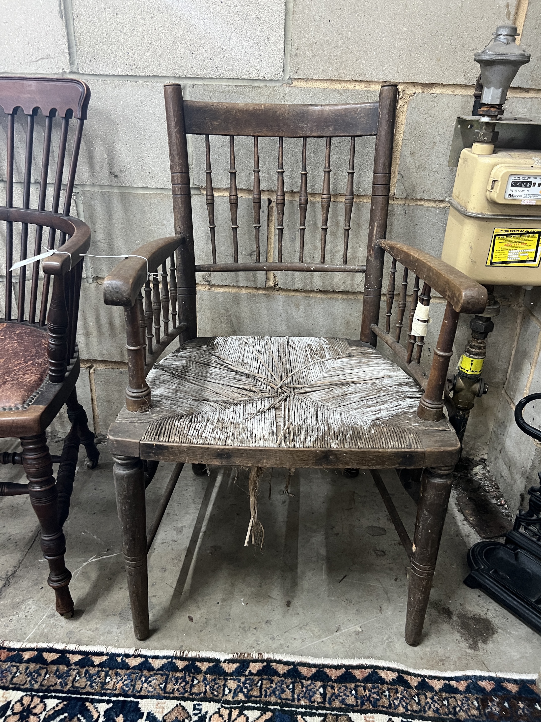A 19th century Sussex elbow chair, width 52cm, depth 46cm, height 90cm